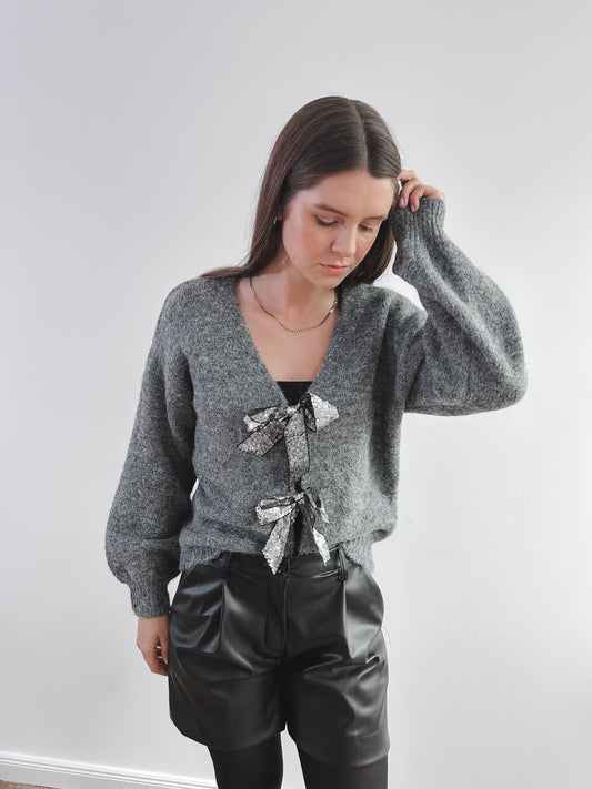 Cardigan mit glitzer Schleife