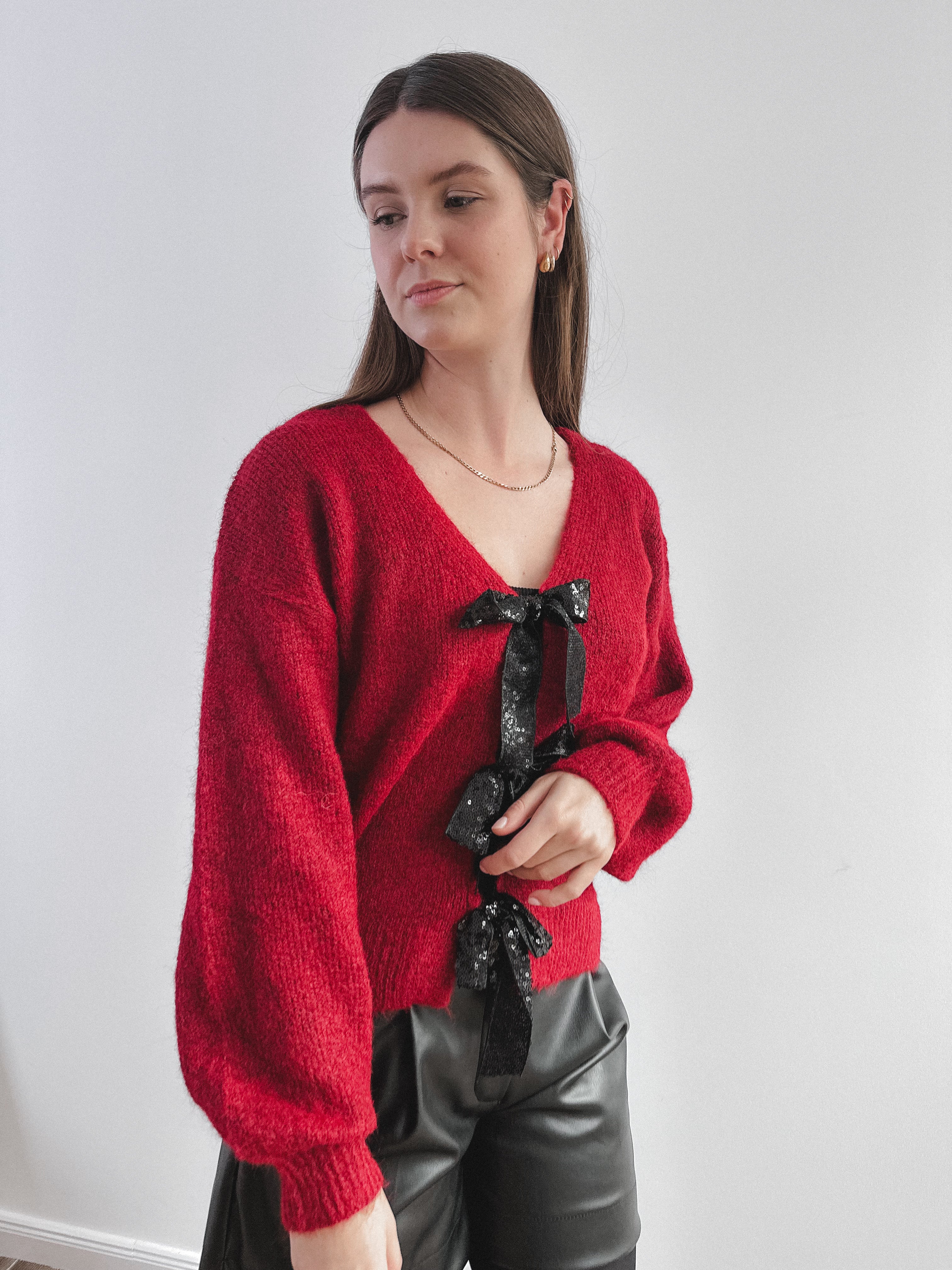 Cardigan mit glitzer Schleife